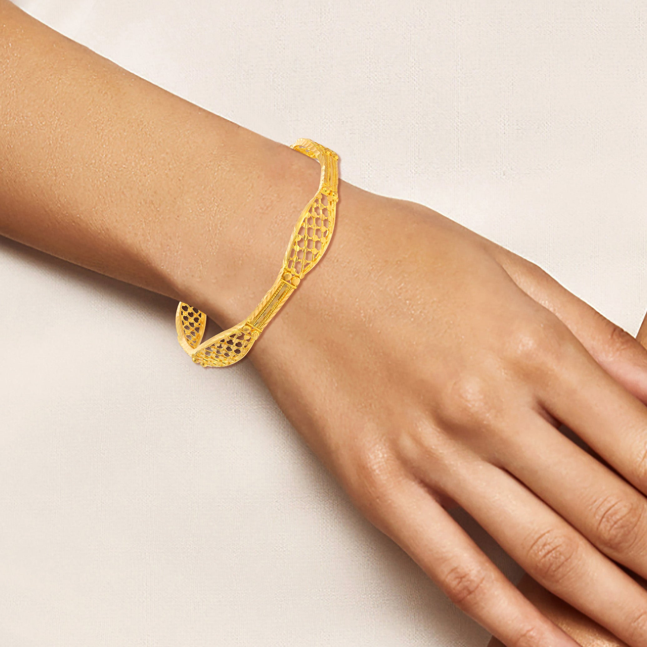 Infinite Waves Gold Bangle